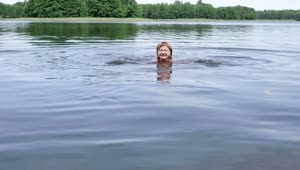Stock Footage Woman Swimming Across A Lake Live Wallpaper Free