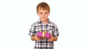 Stock Footage Young Boy Holding A Gift Live Wallpaper Free