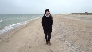 Stock Footage Woman Walking On A Cold Beach Live Wallpaper Free