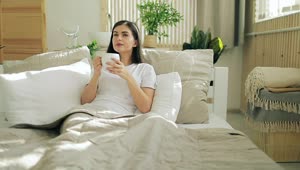 Stock Footage Woman Opens Video Call On Futuristic Hologram Panel In Bed Live Wallpaper Free