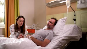 Stock Footage Worried Woman By Her Husband In Hospital Live Wallpaper Free