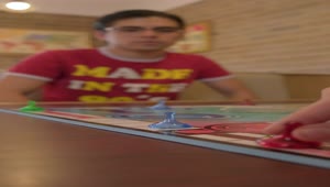 Stock Footage Young People Playing A Board Game With Cards Live Wallpaper Free