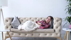 Stock Footage Woman Lying On A Sofa Live Wallpaper Free