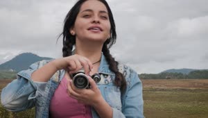 Stock Footage Young Woman Taking Photos In The Field Live Wallpaper Free