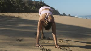 Stock Footage Woman Stretching And Doing Yoga On The Beach Live Wallpaper Free