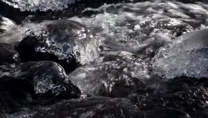Icy River Rocks Video Live Wallpaper