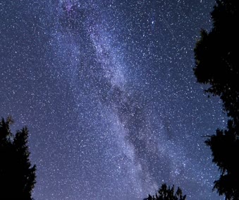A Time Lapse Of A Night Sky Live Wallpaper