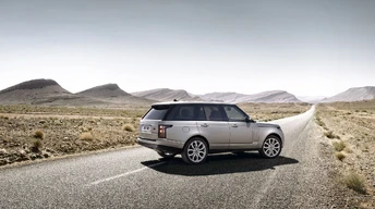 range rover on alone road image wallpaper