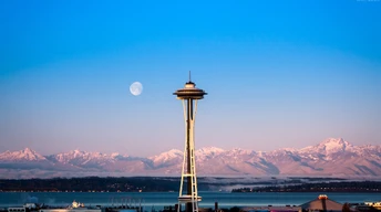 seattle tower sunrise sea ocean water morning moon pink clear sky mountain travel vacation