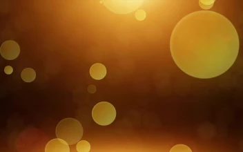 Golden Bokeh HD Video Background Loop bokeh particles with flare left fly 3d space