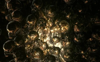 Stock Video 3d animation of a golden surface with skulls PC