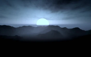 Stock Video 3d cloudy mountain range during a sunset PC