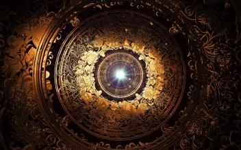 Stock Video 3d tunnel made of highly ornate rings with a light PC