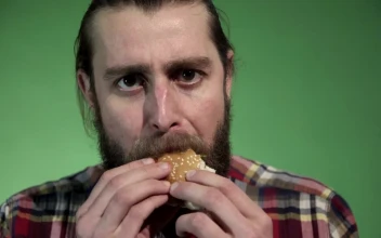 Stock Video A Bearded Man Eating A Burger for PC