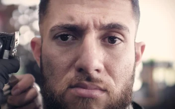 Stock Video A Bearded Man Getting A Haircut for PC