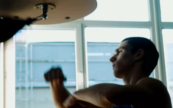 Stock Video A Boxer Hitting The Speed Punching Bag for PC