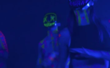 Stock Video A Boy And A Girl Dancing With A Mask for PC
