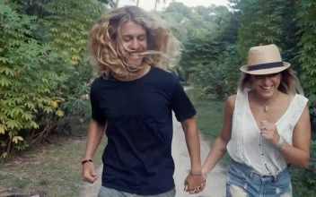 Stock Video A Boy And A Girl Running Through Nature for PC