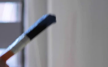 Stock Video A Brush Painting On A Blue Wall for PC