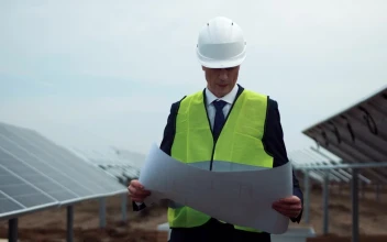 Stock Video A Business Man Checking The Blueprint Outdoors for PC
