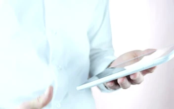 Stock Video A Businessman Holding A Tablet Does The Thumbs Up Sign for PC