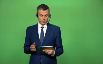Stock Video A Businessman With A Headset And A Tablet Talking for PC