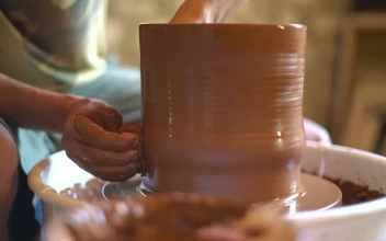 Stock Video A Ceramic Artist Making A Vase for PC