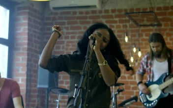 Stock Video A Cheerful Band Playing Music Together for PC