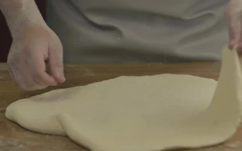 Stock Video A Chef Preparing Pizza Dough for PC