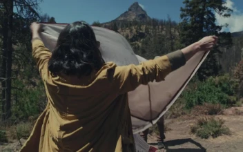 Stock Video A Couple Finishing Up Their Camping for PC