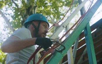Stock Video A Couple Going Into A Rope Adventure for PC