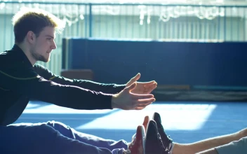 Stock Video A Couple Of Athletes Stretching Each Other for PC