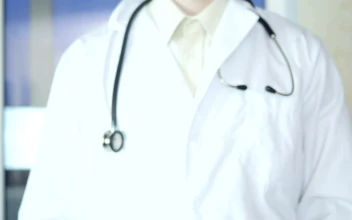 Stock Video A Doctor Making A Heart Shape With His Hands for PC