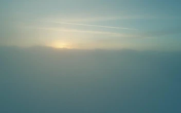 Stock Video Above The Huge Clouds That Cover The Sun for PC