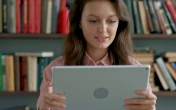 Stock Video Academic Studying With A Tablet At The University Library for PC