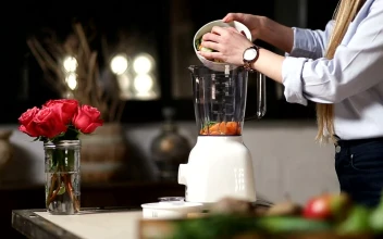 Stock Video Adding Chopped Food To A Blender for PC
