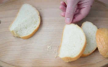 Stock Video Adding Oil To Bread Slices for PC