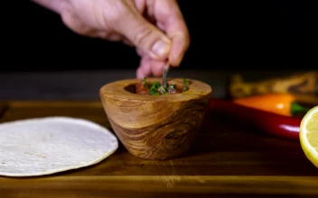 Stock Video Adding Salsa To A Meal for PC