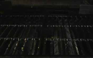 Stock Video Adding Seasoned Steaks To A Grill for PC