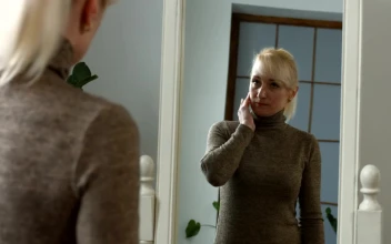 Stock Video Adult Woman Looking In The Mirror for PC