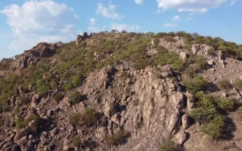 Stock Video Aerial Landscape Around An Arid And Rocky Mountain Range for PC