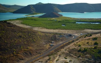 Stock Video Aerial Panorama Of A Landscape With Mountains And A Lake for PC