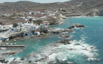 Stock Video Aerial Shot Of A Port Village Seen From The Sea for PC