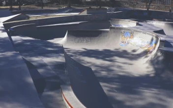 Stock Video Aerial Shot Of A Skater Skating In A Bowl for PC