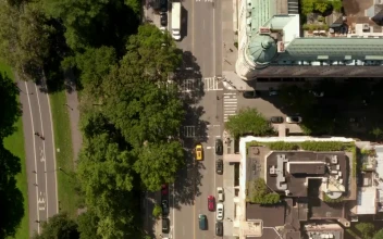 Stock Video Aerial Tour Between City Blocks In New York for PC