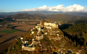 Stock Video Aerial View Of A Medieval Castle In The Mountain for PC
