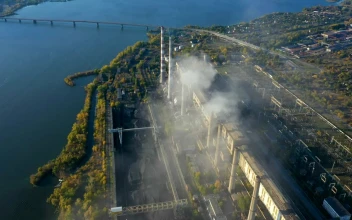 Stock Video Aerial View Of A Power Plant By The River for PC