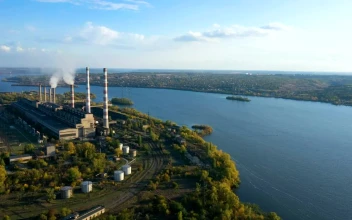 Stock Video Aerial View Of A Power Plant Near The River for PC