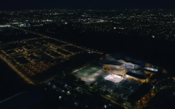 Stock Video Aerial View Of A Sports Center At Night Time for PC