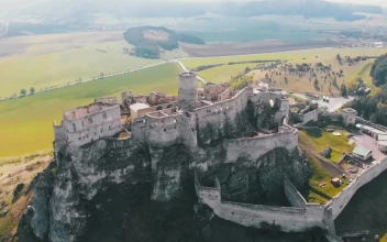 Stock Video Aerial View Of An Old Castle On Top Of A for PC